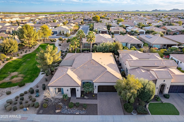 bird's eye view with a residential view and a mountain view