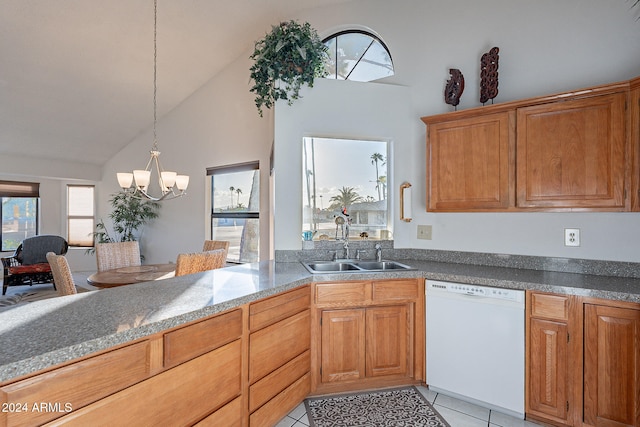 kitchen featuring hanging light fixtures, white dishwasher, light tile patterned flooring, a notable chandelier, and sink