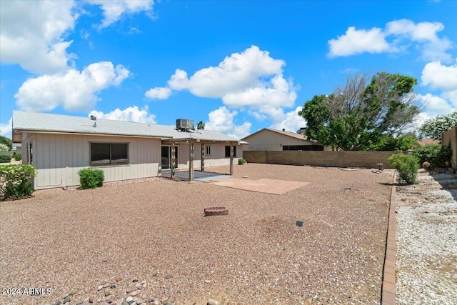 back of property with a patio area