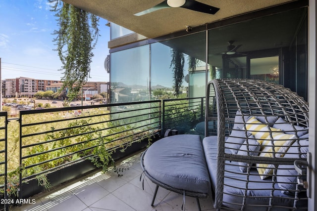 balcony featuring ceiling fan