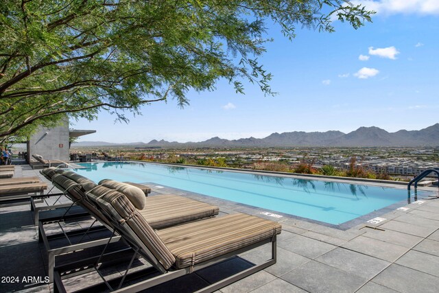 7180 E Kierland Blvd Unit 314, Scottsdale, AZ 85254 - community pool with a mountain view and a patio
