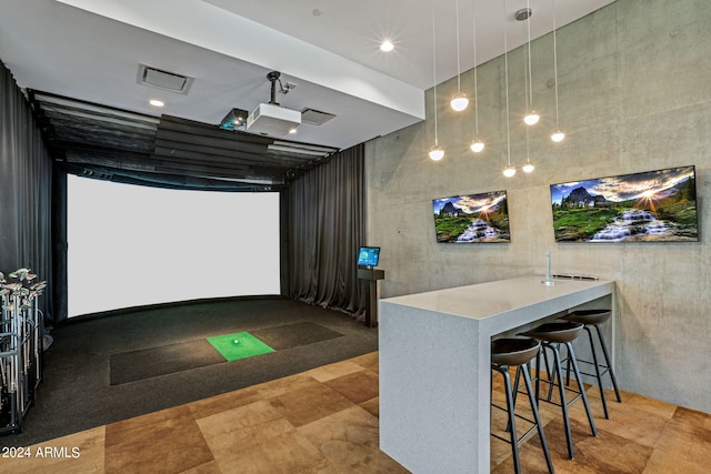 game room featuring golf simulator