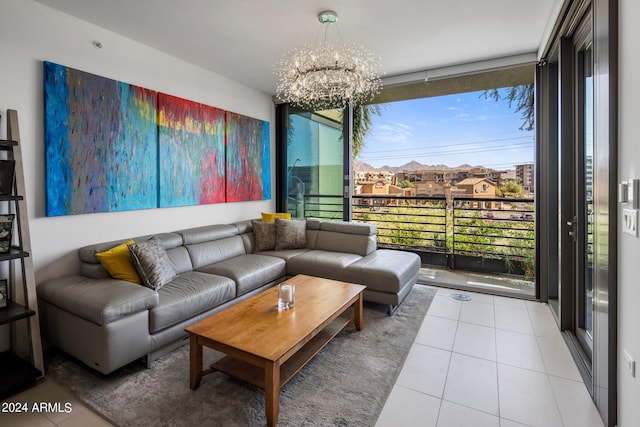 tiled living room featuring a chandelier