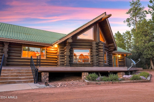 view of front of house featuring a deck