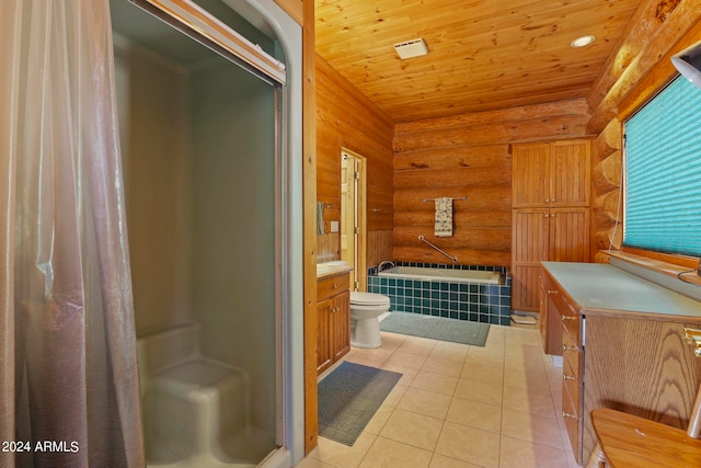 full bathroom with vanity, rustic walls, tile patterned floors, shower with separate bathtub, and toilet