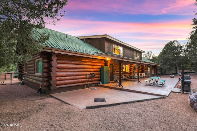 view of front of house featuring a patio