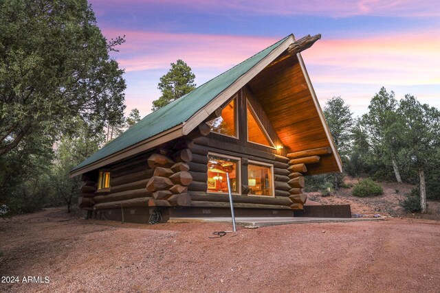 703 N Chaparral Pines Dr, Payson, AZ 85541 - view of front of home featuring metal roof and log exterior