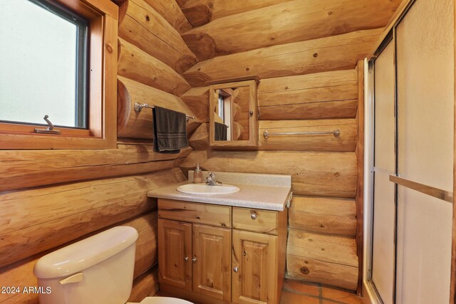 703 N Chaparral Pines Dr, Payson, AZ 85541 - full bathroom with toilet, vanity, a stall shower, and rustic walls