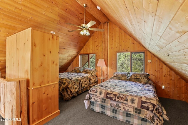 bedroom with dark colored carpet, wood walls, vaulted ceiling, ceiling fan, and wooden ceiling