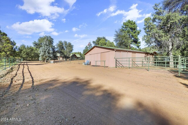 703 N Chaparral Pines Dr, Payson, AZ 85541 - view of horse barn with a rural view