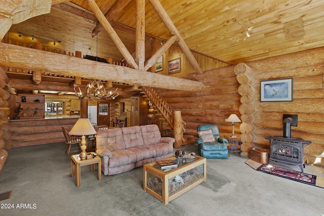 703 N Chaparral Pines Dr, Payson, AZ 85541 - carpeted living area featuring stairway, a wood stove, high vaulted ceiling, a chandelier, and wood ceiling