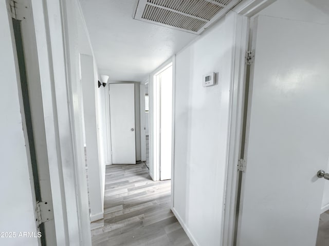 hallway featuring light hardwood / wood-style floors