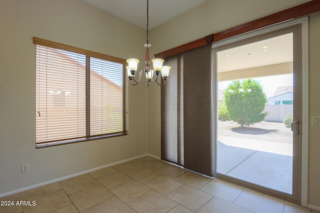 interior space featuring an inviting chandelier