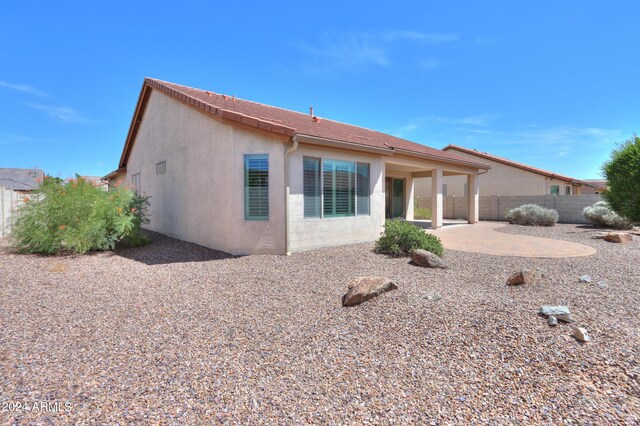 back of house featuring a patio