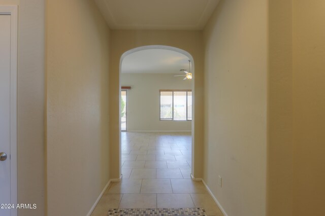 hallway with light tile patterned floors