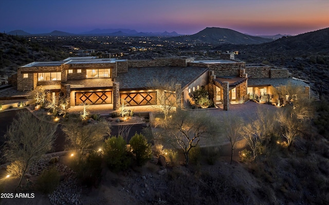 view of front of property with a mountain view