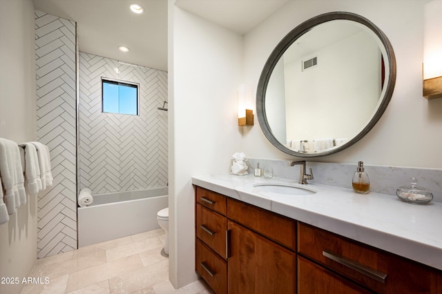 bathroom featuring visible vents, toilet, vanity, washtub / shower combination, and recessed lighting