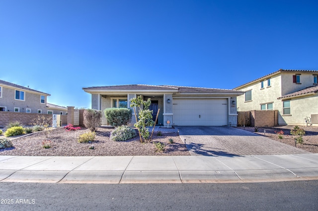 view of front of property featuring a garage