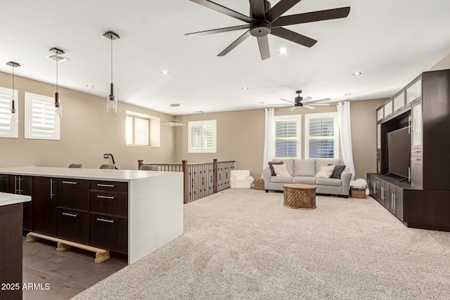 living room featuring ceiling fan