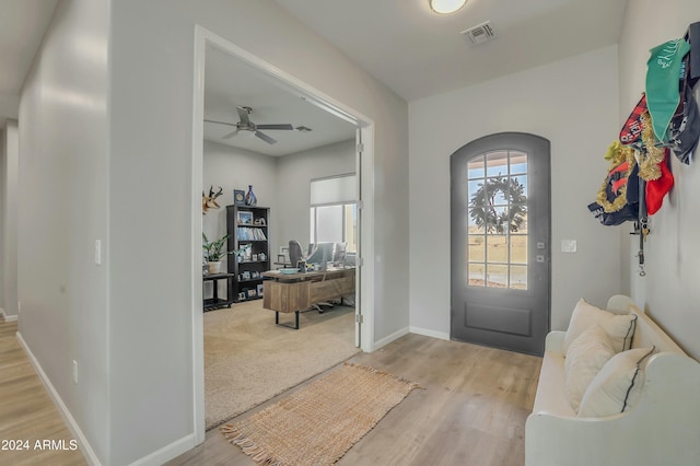 entrance foyer featuring ceiling fan and light wood-type flooring