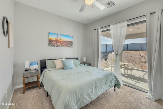 bedroom with access to outside, ceiling fan, and light colored carpet