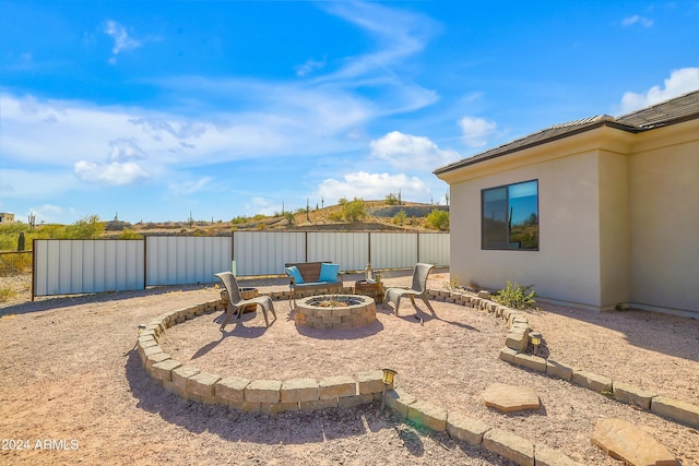 view of patio / terrace featuring a fire pit