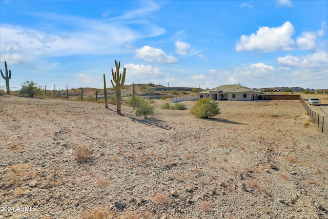 view of yard with a rural view