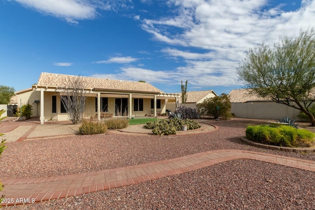 back of property featuring a patio