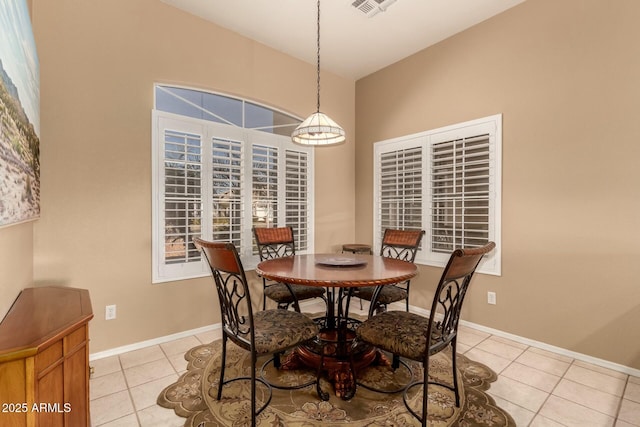 dining room with light tile patterned floors