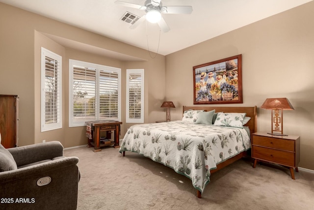 bedroom with ceiling fan and carpet