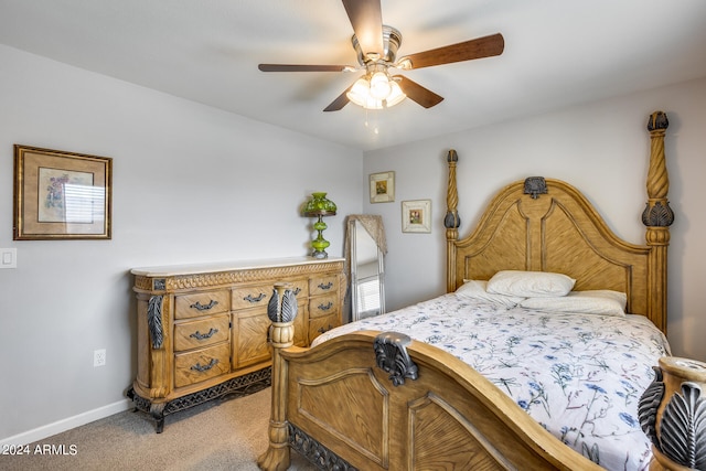 bedroom with ceiling fan and carpet floors