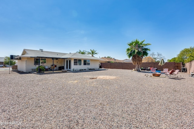 rear view of property with a patio area