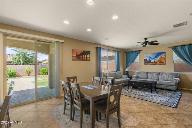 3936 E Narrowleaf Dr, Gilbert, AZ 85298 - dining room with healthy amount of natural light, light tile patterned flooring, recessed lighting, and ceiling fan