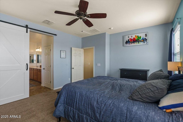 3936 E Narrowleaf Dr, Gilbert, AZ 85298 - carpeted bedroom featuring a barn door, baseboards, ceiling fan, and ensuite bath