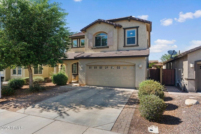 3936 E Narrowleaf Dr, Gilbert, AZ 85298 - view of front of property featuring driveway, a tile roof, a garage, stucco siding, and a gate