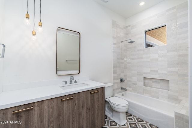 full bathroom with tiled shower / bath combo, vanity, and toilet