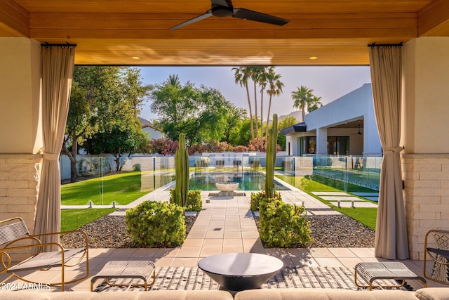 view of patio / terrace featuring ceiling fan