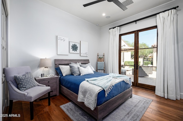 bedroom featuring wood finished floors, visible vents, recessed lighting, access to exterior, and french doors