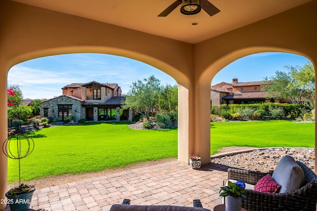 view of patio / terrace featuring a ceiling fan