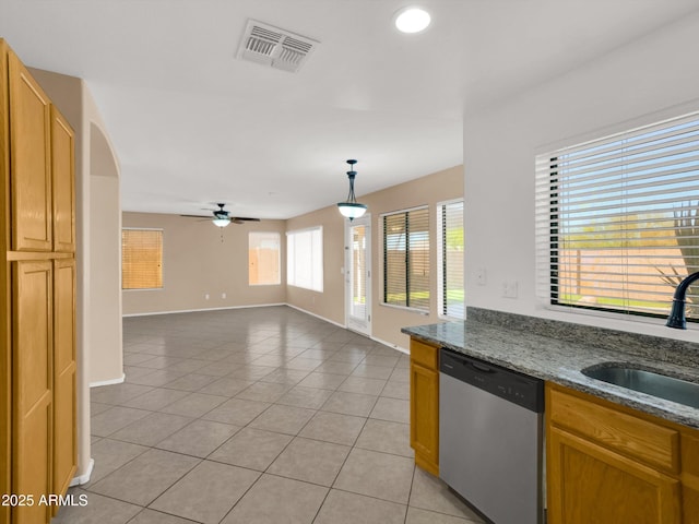 13620 N 82nd Ln, Peoria, AZ 85381 - kitchen featuring dishwasher, a sink, light tile patterned flooring, baseboards, and a ceiling fan