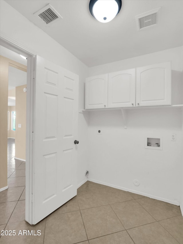 13620 N 82nd Ln, Peoria, AZ 85381 - laundry area featuring hookup for a gas dryer, washer hookup, cabinet space, light tile patterned floors, and electric dryer hookup