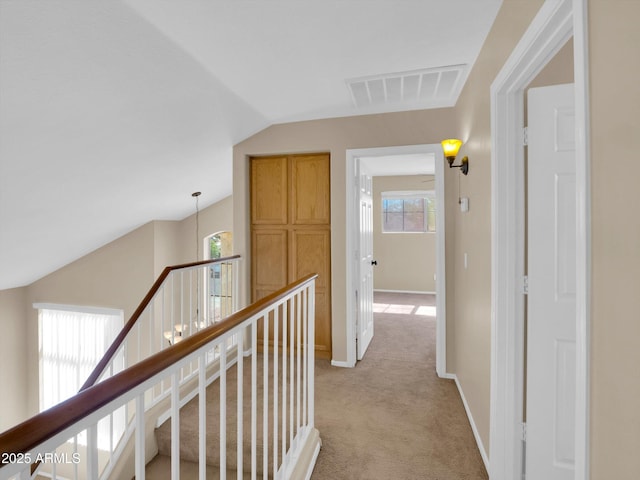 13620 N 82nd Ln, Peoria, AZ 85381 - corridor with an upstairs landing, light carpet, lofted ceiling, and baseboards