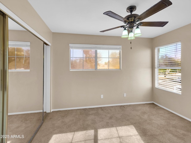 13620 N 82nd Ln, Peoria, AZ 85381 - unfurnished bedroom with carpet flooring, multiple windows, and a closet
