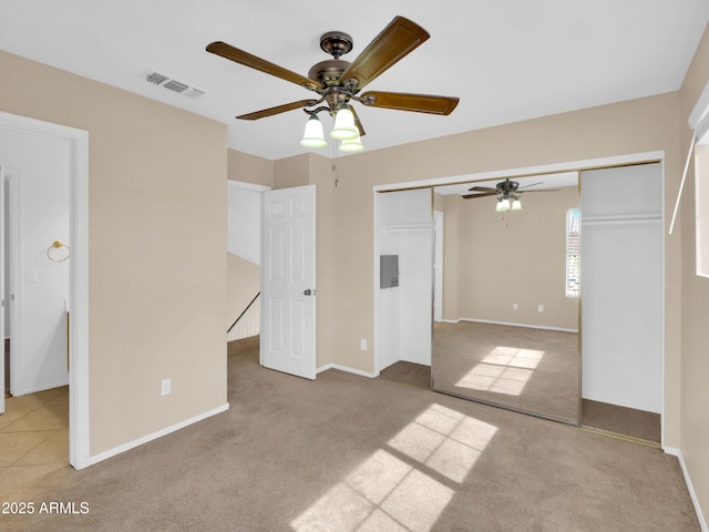 13620 N 82nd Ln, Peoria, AZ 85381 - unfurnished bedroom featuring carpet floors, a closet, baseboards, and a ceiling fan