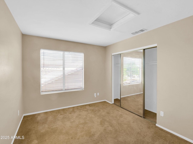 13620 N 82nd Ln, Peoria, AZ 85381 - unfurnished bedroom with carpet, attic access, a closet, and baseboards