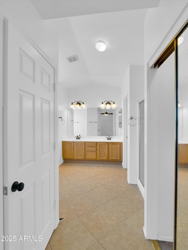13620 N 82nd Ln, Peoria, AZ 85381 - full bath featuring lofted ceiling, double vanity, and tile patterned floors