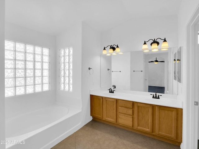 13620 N 82nd Ln, Peoria, AZ 85381 - full bath with tile patterned floors, a bath, double vanity, and lofted ceiling