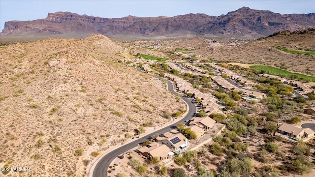 birds eye view of property featuring a mountain view