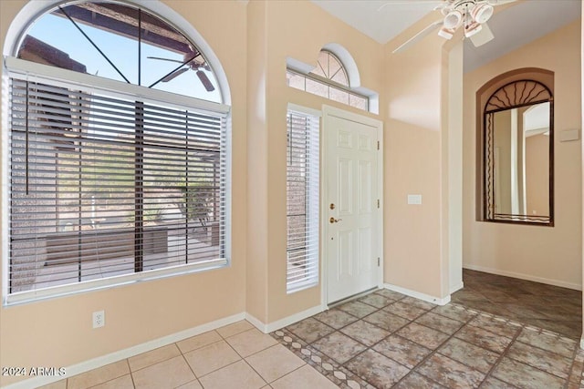 entrance foyer featuring ceiling fan