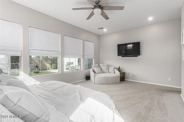 bedroom with ceiling fan and carpet floors